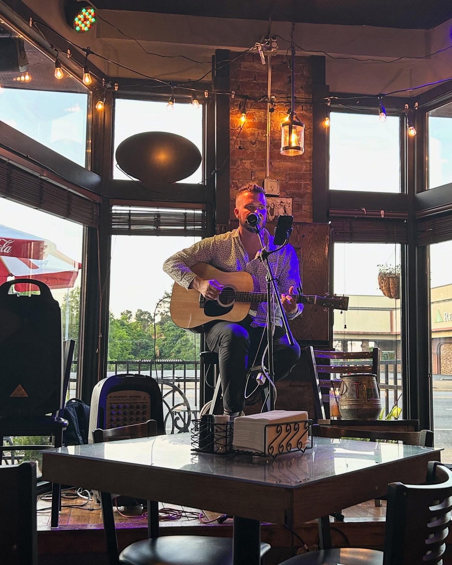 Daniel performing in a restaurant