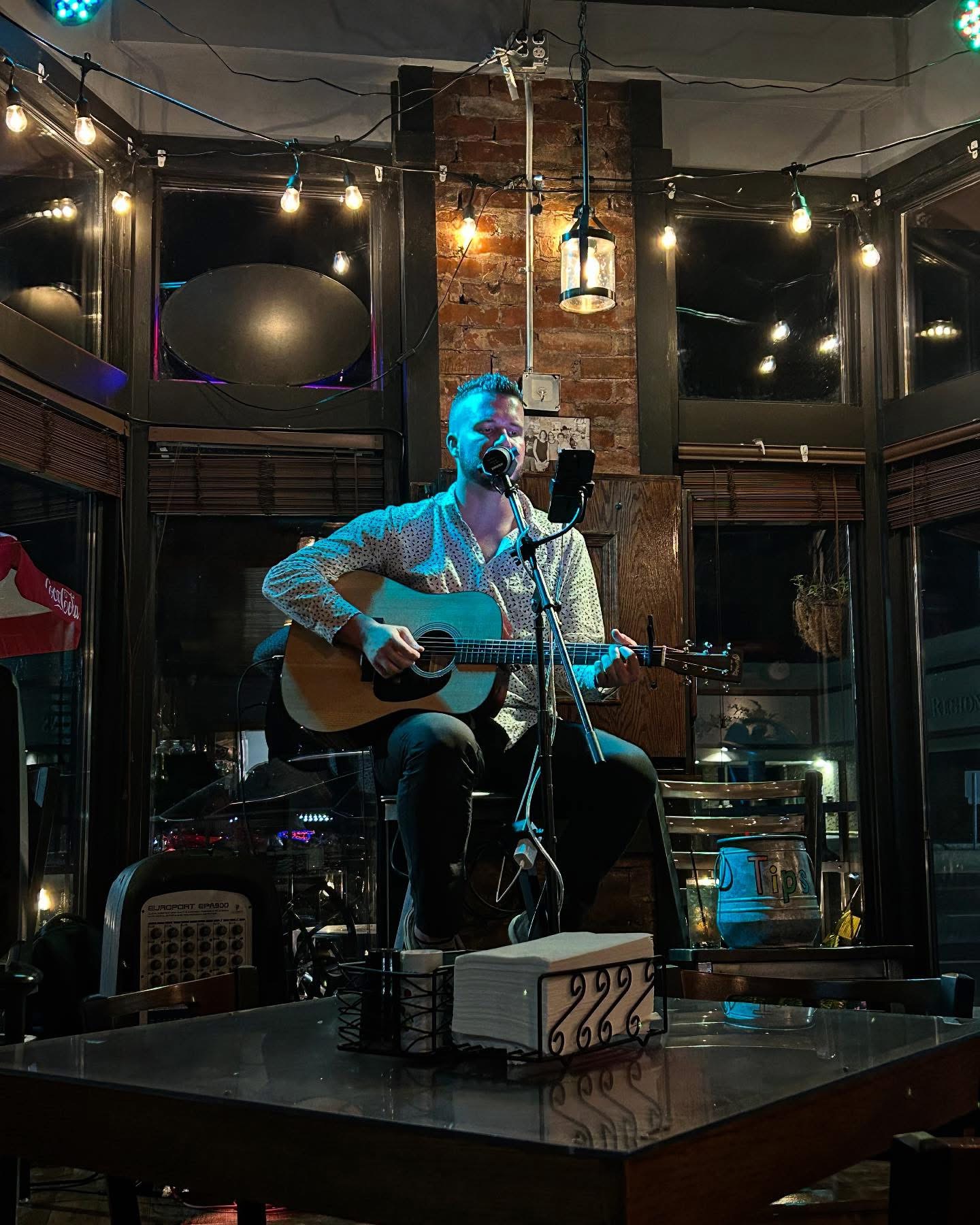 Daniel performing in an intimate venue